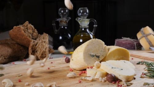 Restaurant Concept. Table Setting. Sliced Hard Cheeese Put on Wooden Background with Home Made Bread