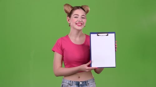 Young Woman Holding Clipboard with Paper on Green Screen