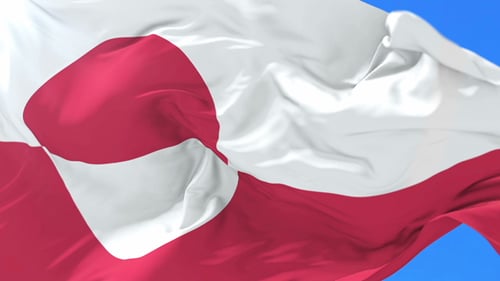 Realistic Waving Flag of Greenland against Blue Sky