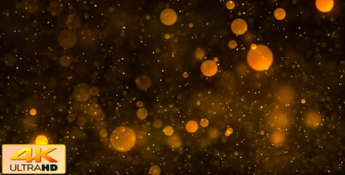 Abstract Golden Shimmering Particle Bokeh Background