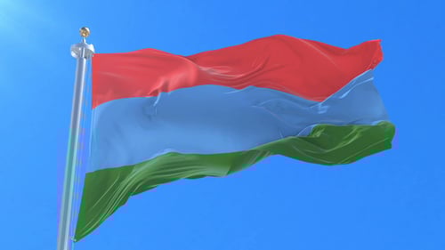 Realistic Red Blue Green Striped Flag Waving in Blue Sky