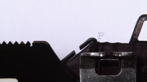 Typewriter Types the Word Philosophy on Paper