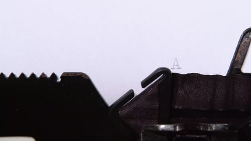 Typing Action Plan on a Vintage Typewriter