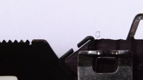 Typewriter Types Chapter One on White Paper