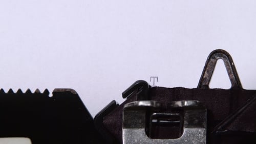 Vintage Typewriter Writes "Top Secret" on Paper