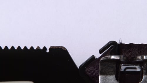 Vintage Typewriter Types the Word Application Close Up