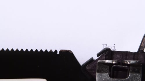 Typewriter Types "Episode 1 Chapter 1" on Paper