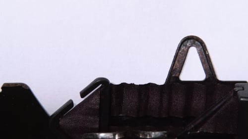 Vintage Typewriter Writes the Word "Hello"