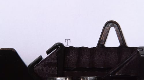 Vintage Typewriter Types the Word Travel