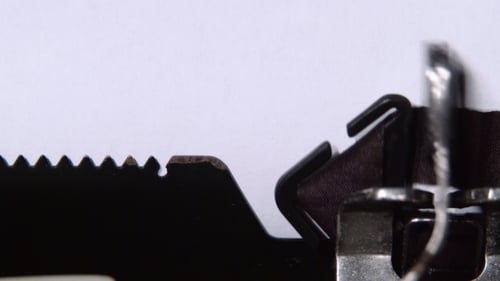 Writer on a Typewriter Writes the Word Results