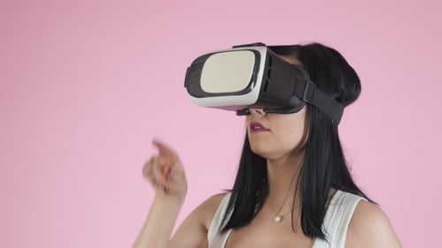 Young Woman Uses VR Headset Technology