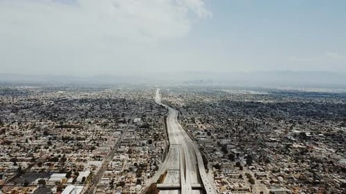Epic Panoramic Aerial View of Amazing American Suburbs Skyline, Beautiful Blue Sky and Large Highway