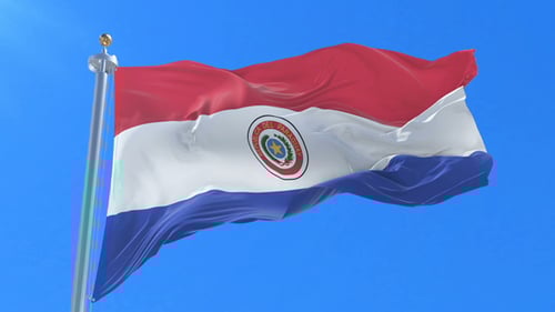 Waving Paraguay Flag Against Clear Blue Sky