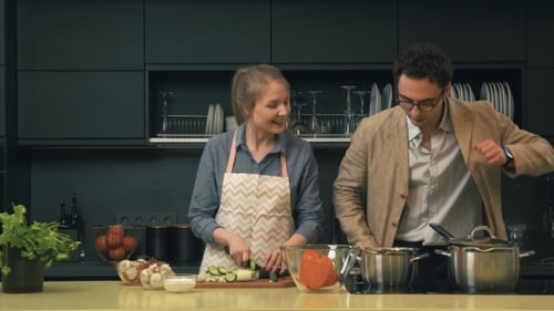 Couple Cooking Together in a Modern Kitchen