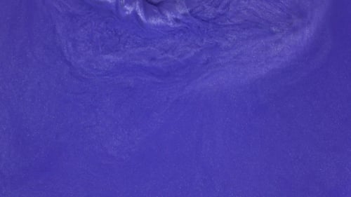 Abstract Swirling Glistening Liquid in Shades of Purple