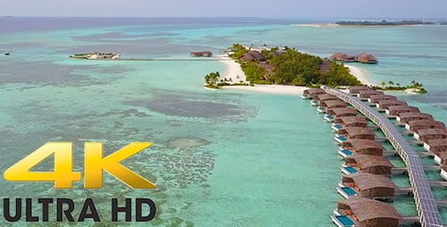 Foto aérea de vilas extravagantes sobre a água nas Maldivas