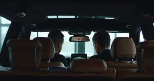 Customer and Dealer in Car