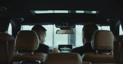 Customer and Dealer in Car