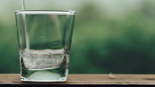 Sparkling Liquid Being Poured into Glass, Close Up