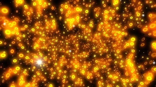 Golden Ring Particles Swirl and Glow Abstract Background