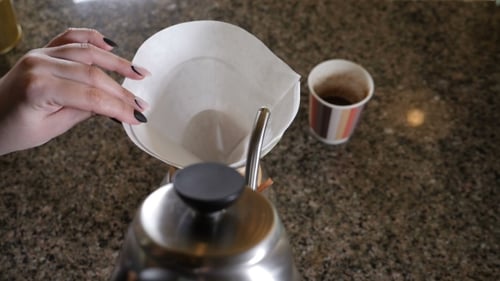 Hands Preparing Pour Over Coffee At Home