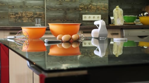 Ingredients and Tools for Cooking Cake on the Glass Table