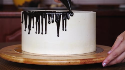 Decorating Cake with Chocolate Icing