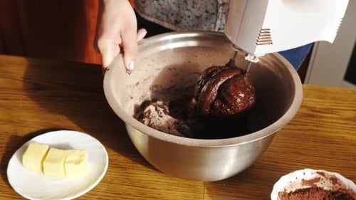 Cooking Cake. View of Mixing Chocolate Dough in a Bowl
