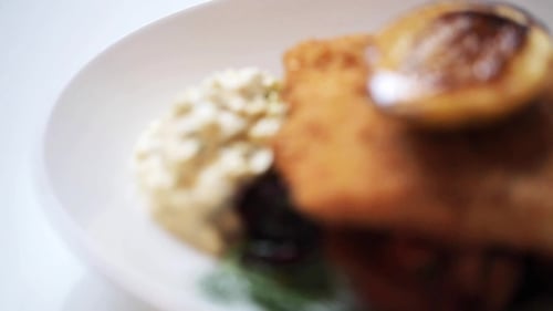 Close-up of delicious food with sauce and vegetables