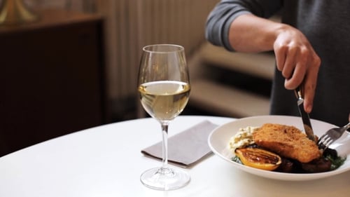 Woman Eating Fish Salad at Cafe or Restaurant 26