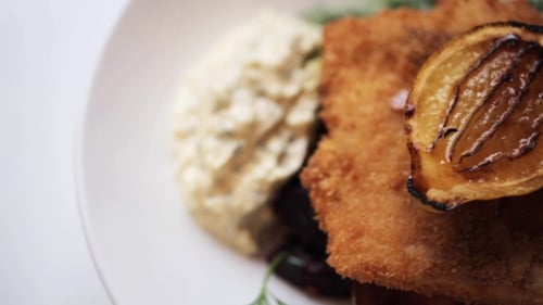 Close-Up of Fried Fish with Charred Lemon