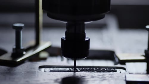 The Plant for the Production of Metal Products Using a Lathe Creates a Lid for the Case of a Laptop
