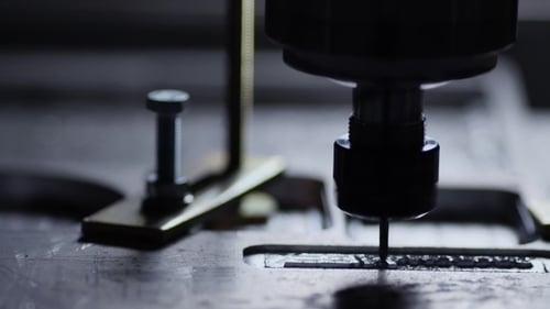 Close Up of CNC Machine Cutting Metal