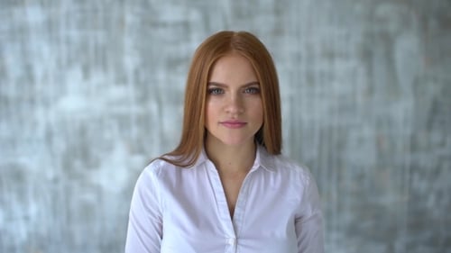 Attractive Woman Smiling and Talking Indoors Portrait