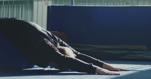 Sportsman Bending and Stretching