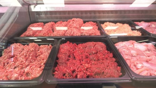 Showcase in the Store with Pork Meat, Beef, Poultry