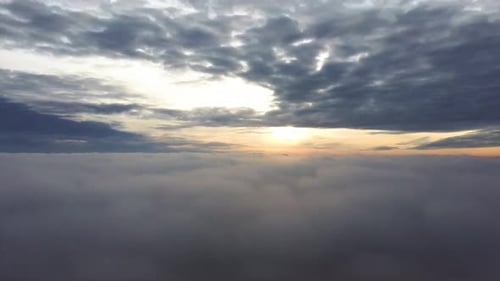 Aerial View of Clouds at Sunrise or Sunset