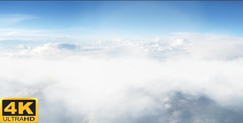 Flying Above White Clouds in Blue Sky Seamless Loop