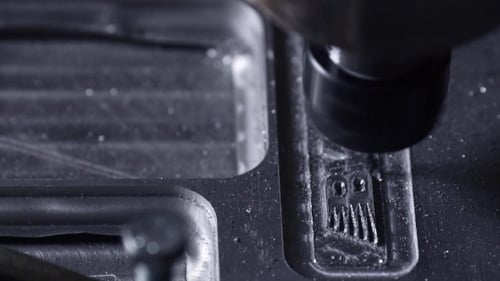 Drill Bit Slowly Carves Out the Aluminum Plate