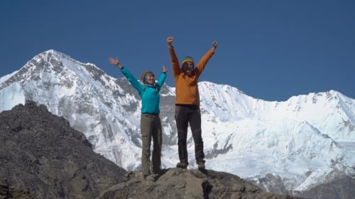 Man and Woman on Top of the Mountain