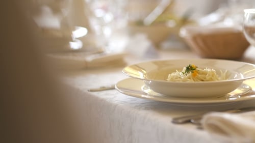 Elegant Table Setting with Pasta Dish