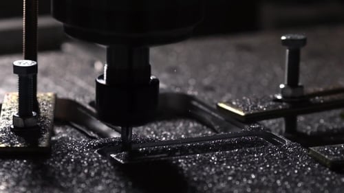 The Robot in the Company with the Help of a Program Written To Work with Steel Is Cut From an