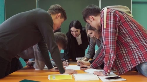 Students Collaborating on Project in Classroom