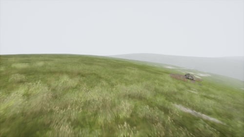 Aerial Green Hills Landscape in Fog