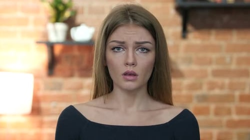 Portrait of Crying Young Girl