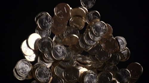 Euro Coins Falling on Black Background