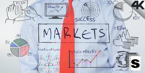 Business Person Writing Markets on Clear Surface