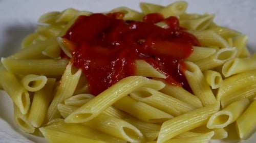 Penne Pasta Topped With a Bright Red Sauce