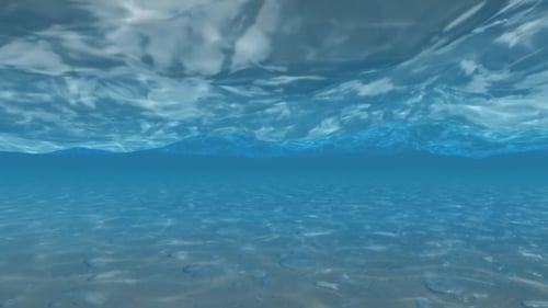 Dynamic Underwater View of Rippling Water Surface and Seabed