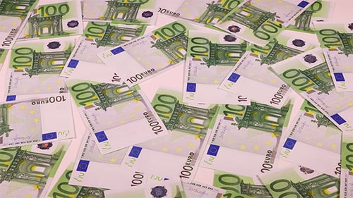 Scattered One Hundred Euro Banknotes Background